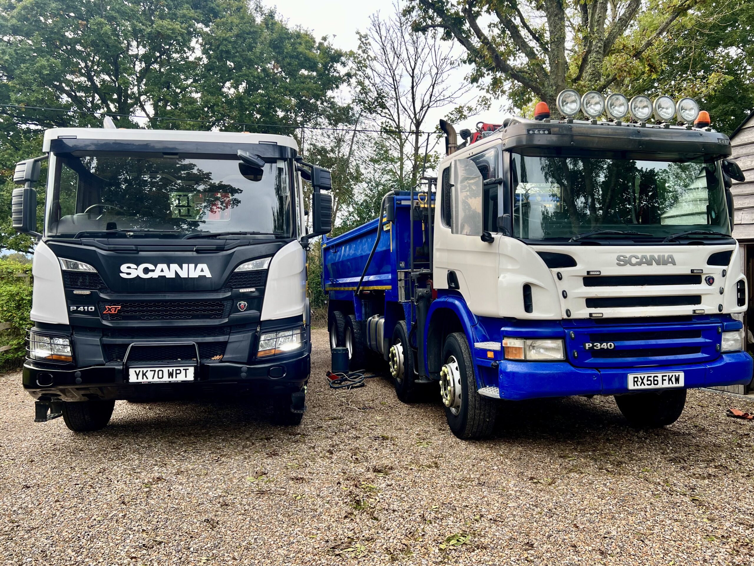 AFD Transport old and new trucks side by side